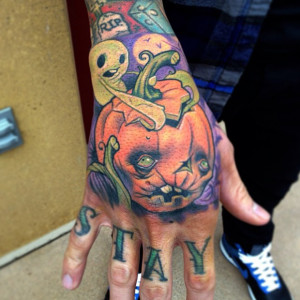 30 Creative Hand Tattoo Designs