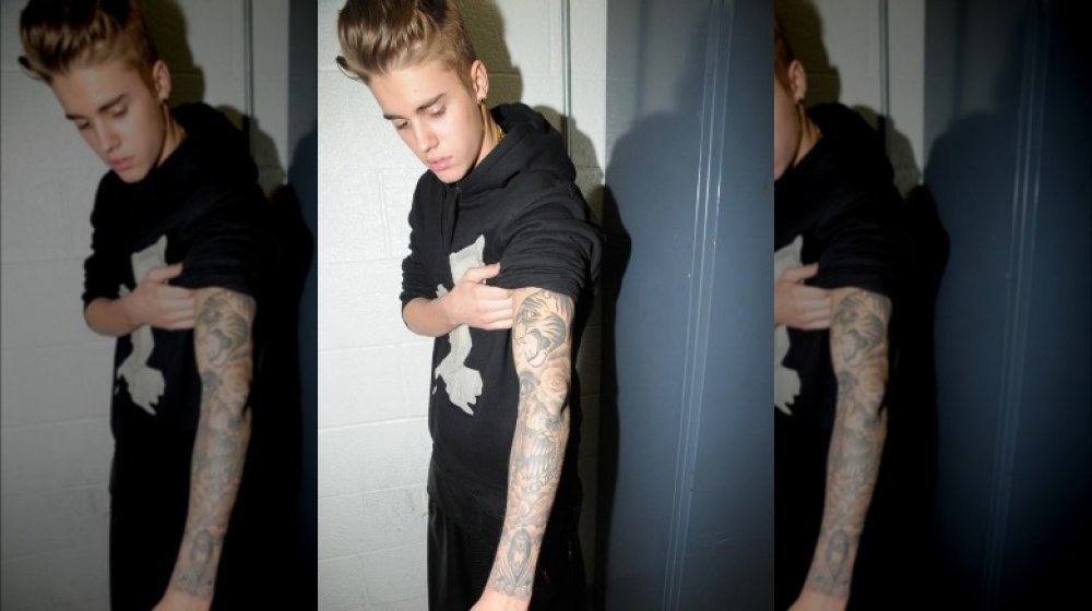 A Complete Guide To All 56 Of Justin Biebers Tattoos