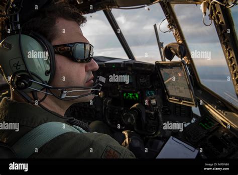 A Pilot With The 4Th Special Operations Squadron Flies An Ac 130U