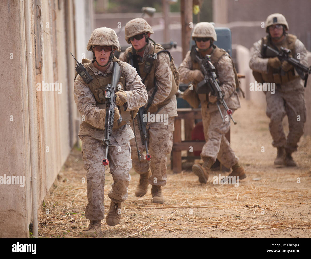 A Squad With 2Nd Battalion 3Rd Marines Prepares To Clear Out A