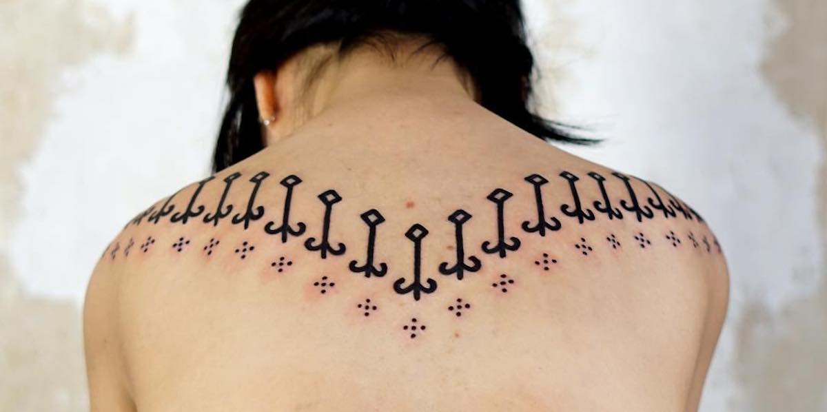 Removing Back Out Tattoo Designs Safely