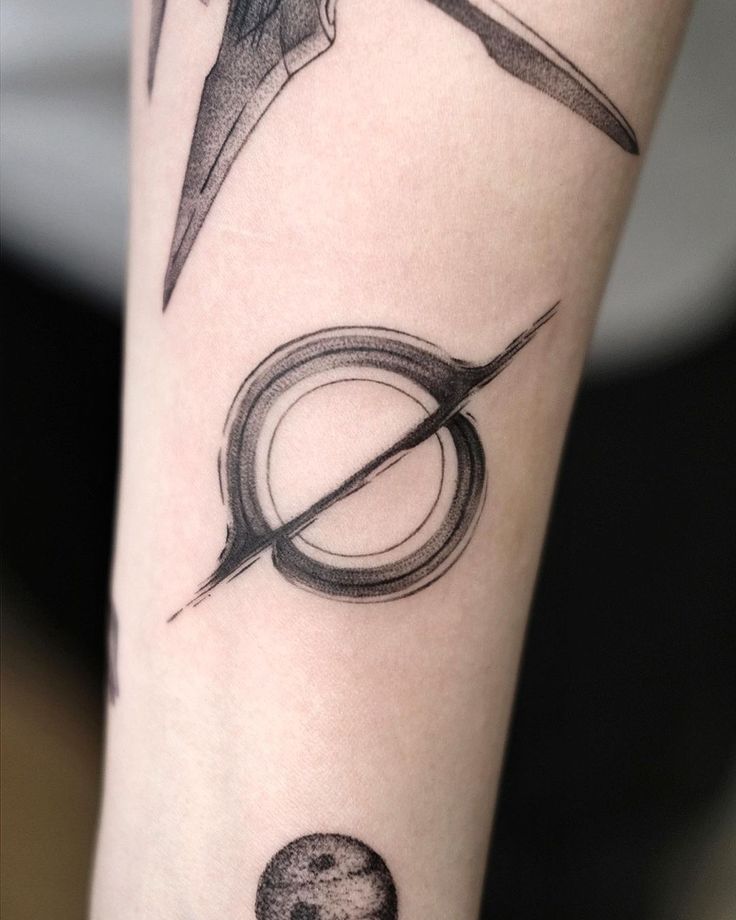 Cosmic Ink: The Allure of Black Hole Tattoos Revealed