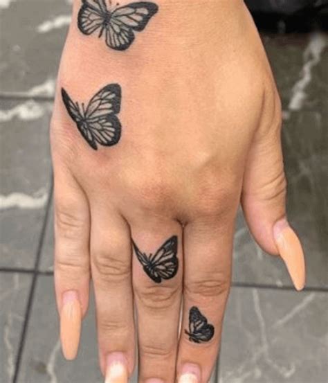 Butterfly Hand Tattoo Best Tattoo Ideas Gallery