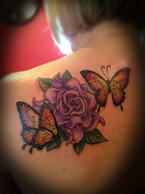 Beautiful Butterfly on Flower Tattoo Design Ideas