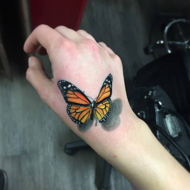 Hand Tattoo Inspiration: Delicate Butterfly Designs