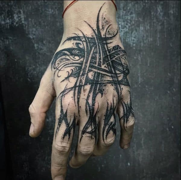 7 Dark Hand Tattoos You'll Love