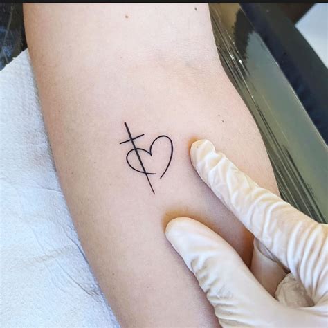 Cross Heart Tattoo Meaning and Design Inspiration Guide