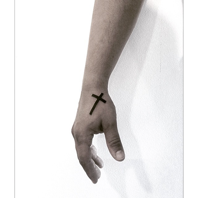 Cross Tattoo on Hand: Meaning and Design Ideas