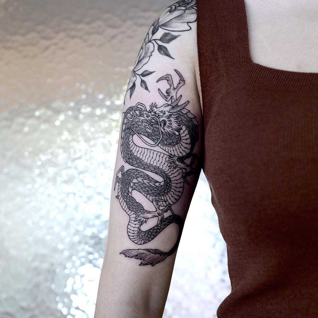 10 Dragon Arm Tattoo Designs You'll Love