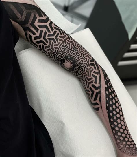 Forearm Geometric Tattoo Designs for a Bold Statement