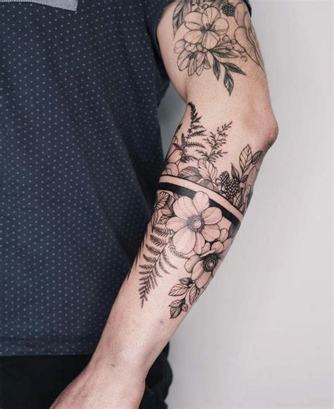 10 Guy Flower Tattoo Designs to Know About