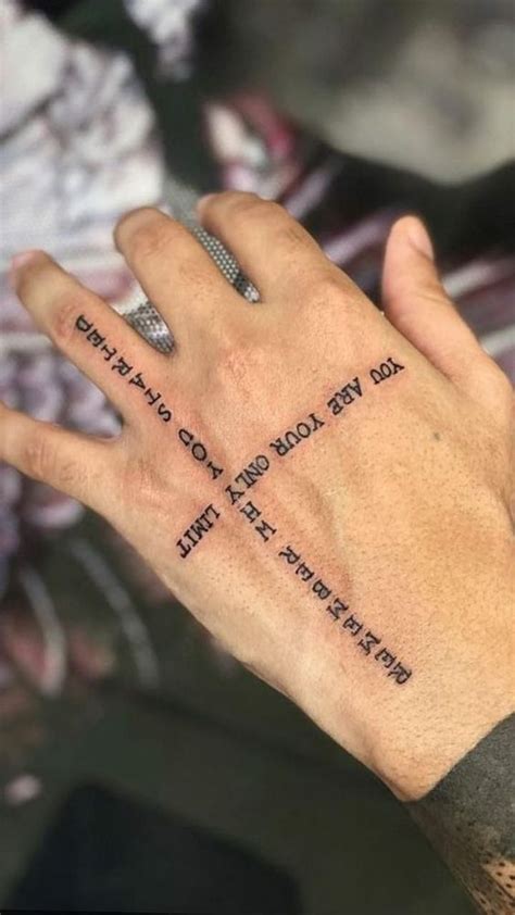 7 Small Hand Tattoos for Men That Make a Statement