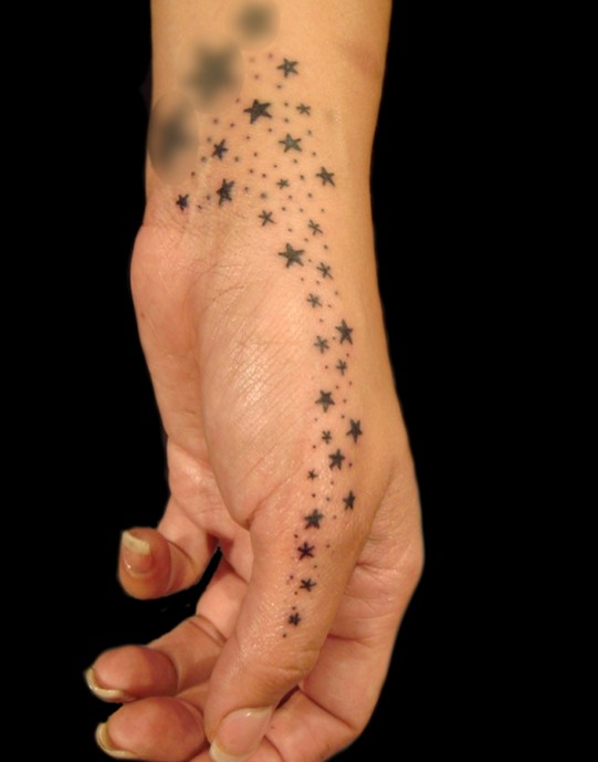 Hand Star Tattoo Designs