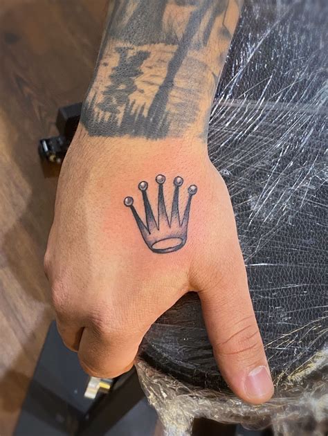 5 Crown Hand Tattoo Designs You'll Love