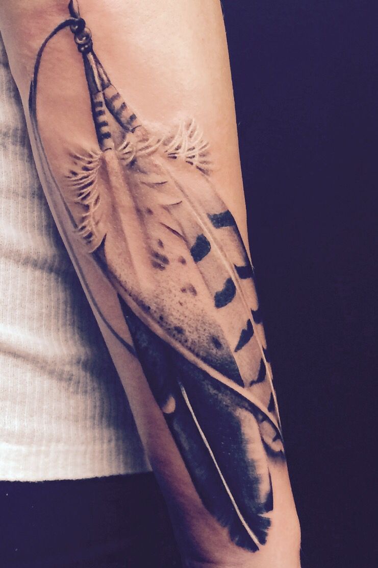 Meaning and Beauty of Indian Feather Tattoos Designs