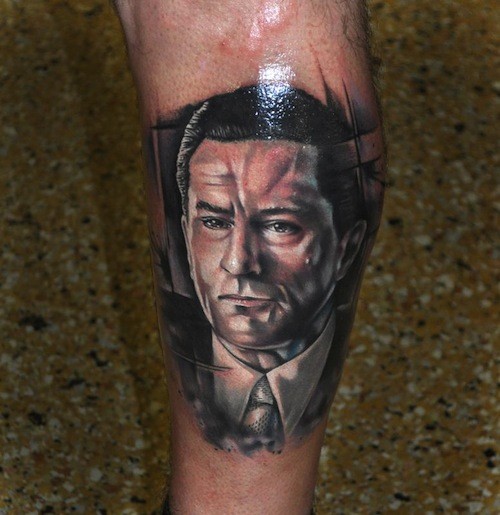 Modern Style Colored Leg Tattoo Of Bruce Lee Portrait With Lettering