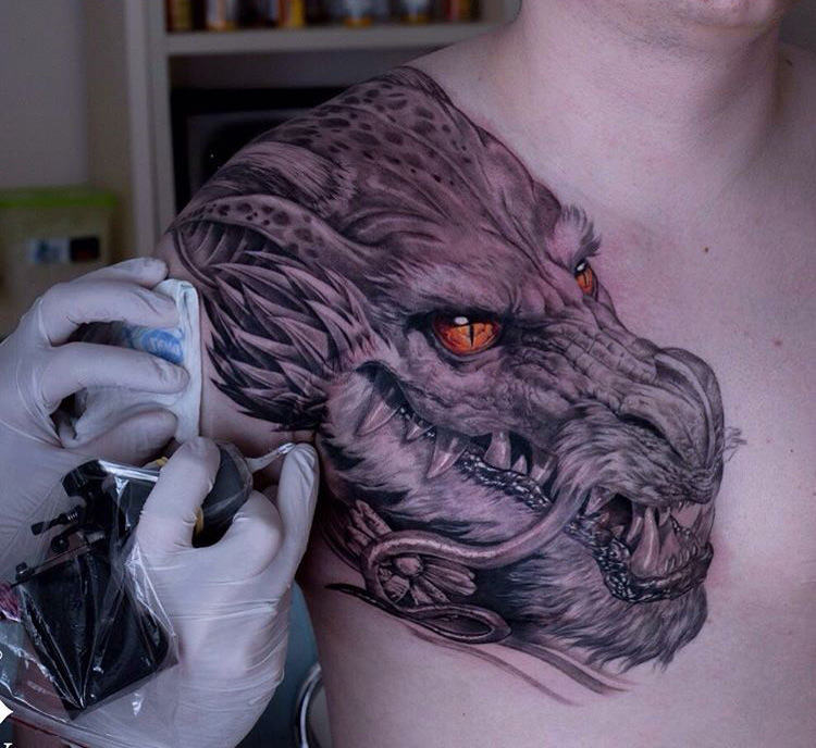 New School Dragon Eye Tattoo On The Chest