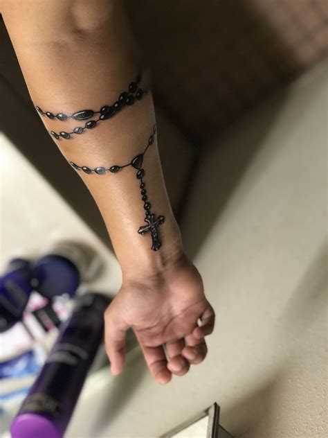 Rosary Arm Tattoos: A Symbol of Faith and Style