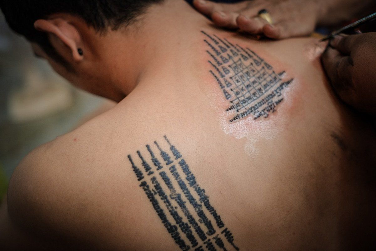 Sacred Ink Traditional Thai Tattoos And Their Meanings Slumber Party