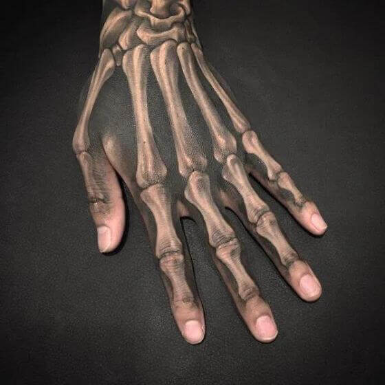 7 Unique Skeleton Hand Tattoo Designs