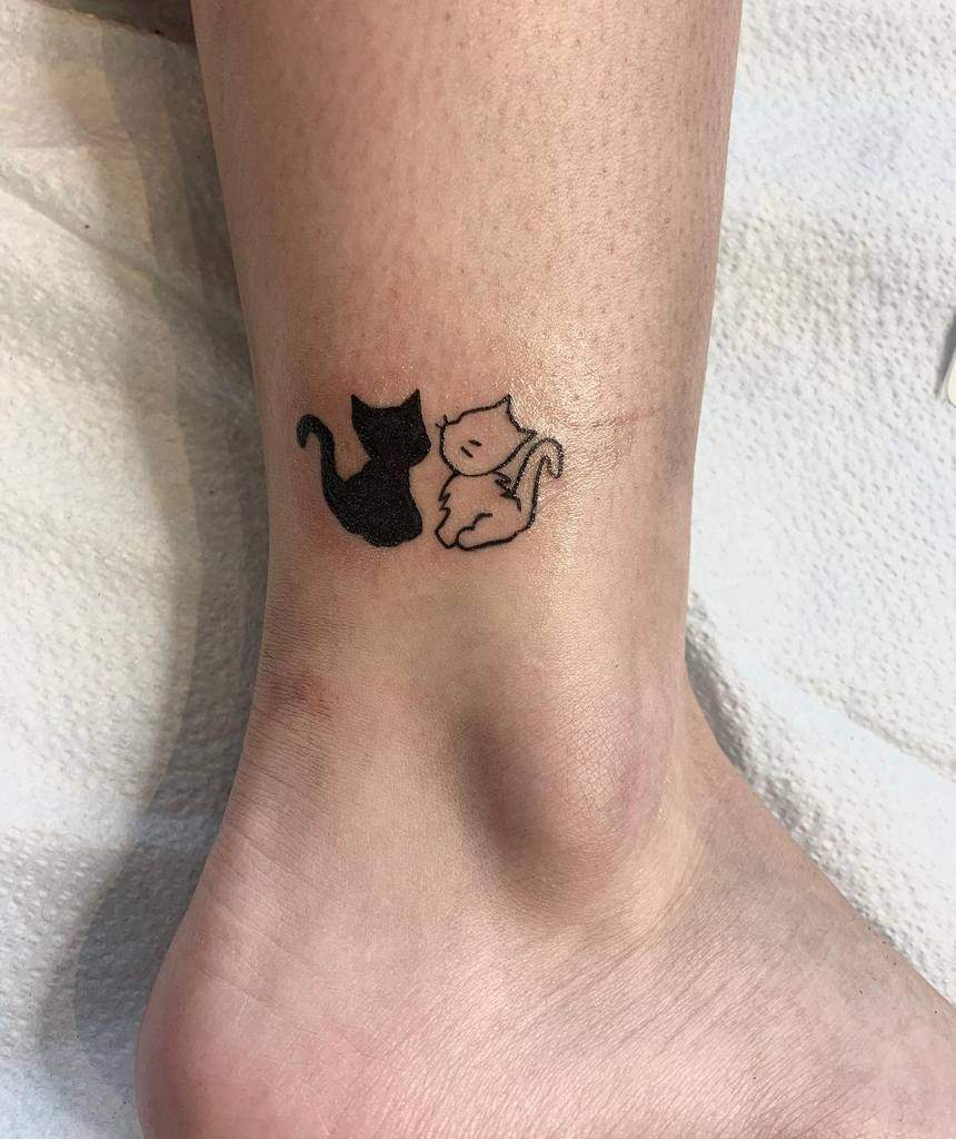 Small Cat Tattoo Designs and Meaning Explained