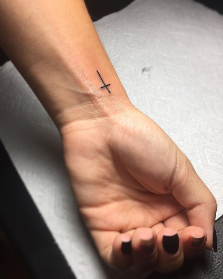 7 Small Cross Tattoo Ideas with Big Meaning