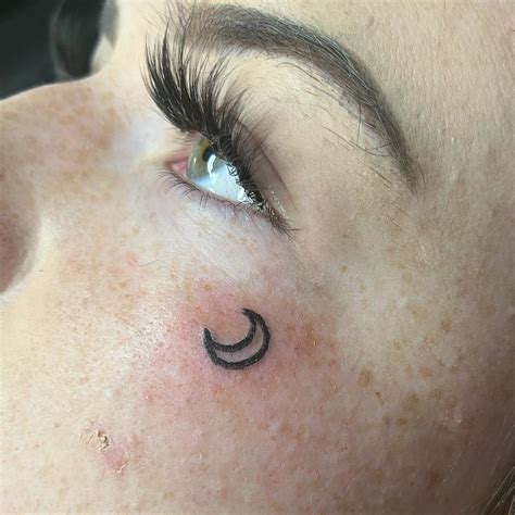 Small Face Tattoo Designs to Elevate Your Style