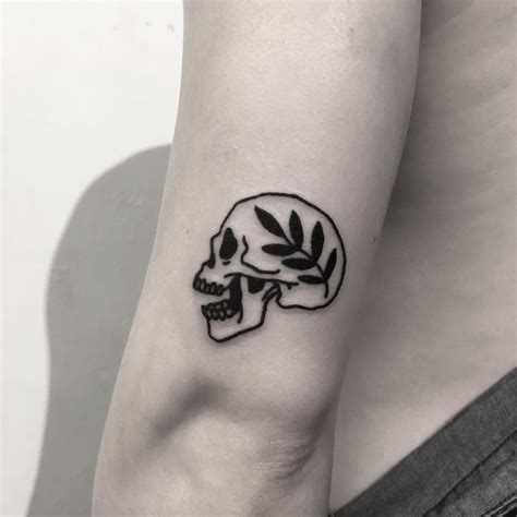 Small Skull Tattoo Designs and Meanings Explained