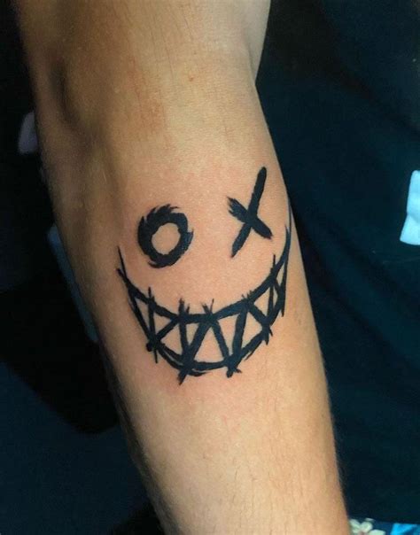 7 Meaningful Smiling Face Tattoo Ideas