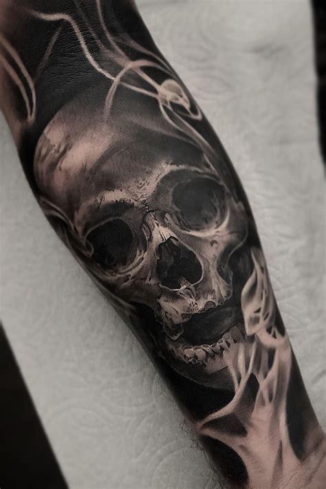 7 Meaningful Smoke with Skulls Tattoo Ideas