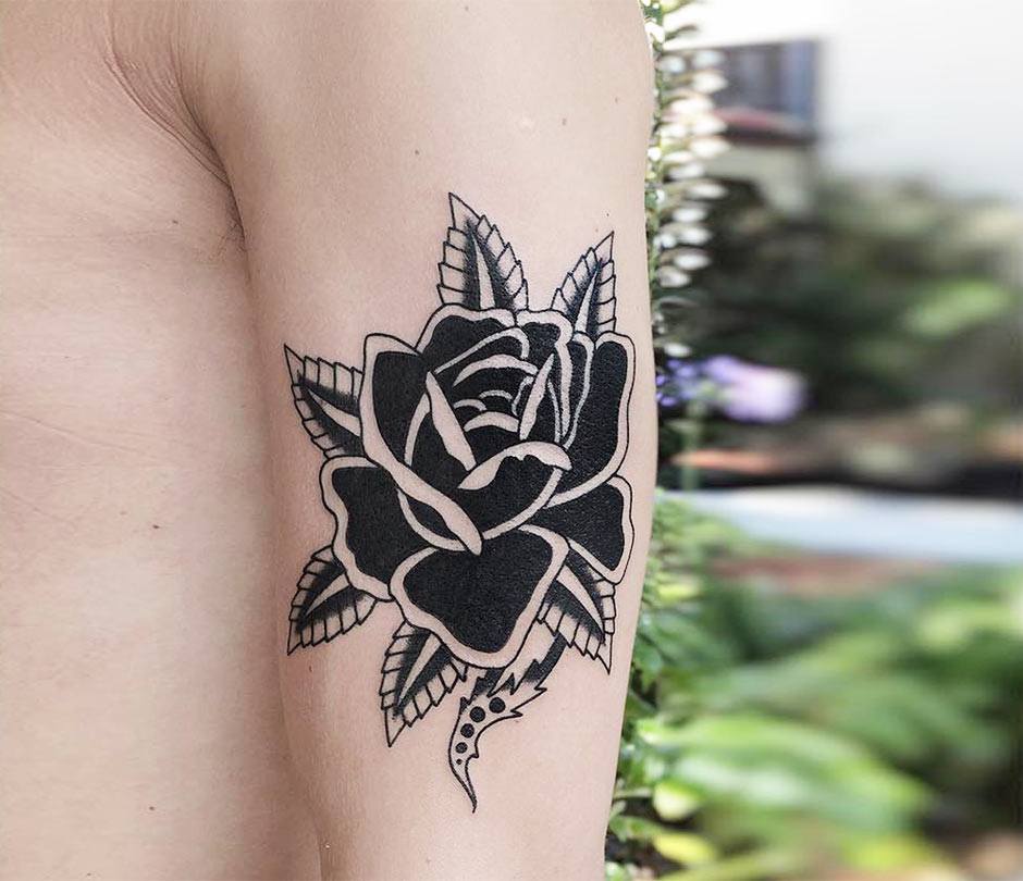 5 Meaningful Ways to Wear a Black Rose Tattoo