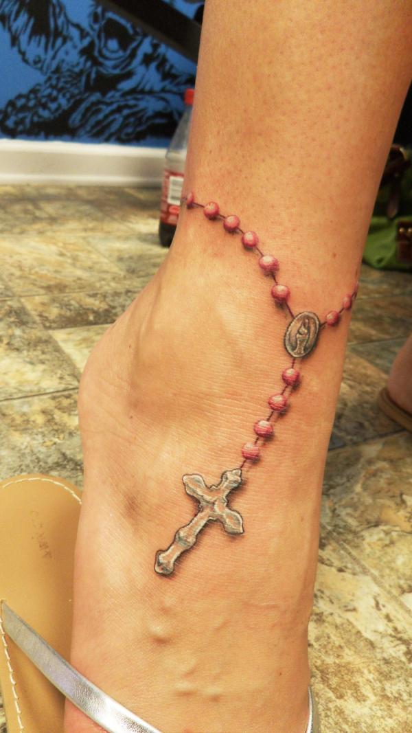 Rosary Beads Tattoos Symbolizing Faith and Spirituality