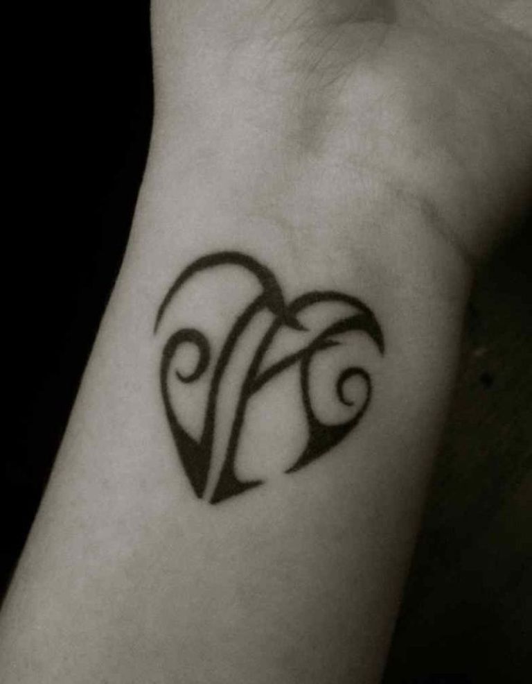 Vine Wrist Tattoo with Initials: A Delicate Beauty