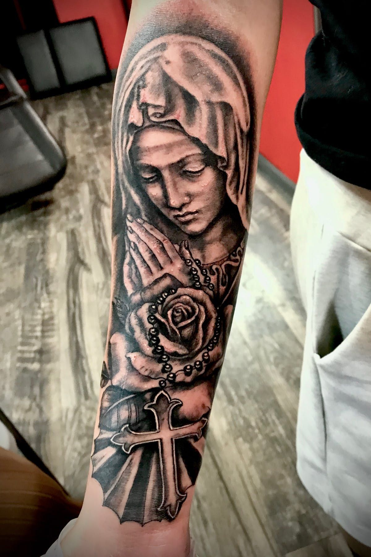 Virgin Mary Forearm Tattoo Designs and Meaning