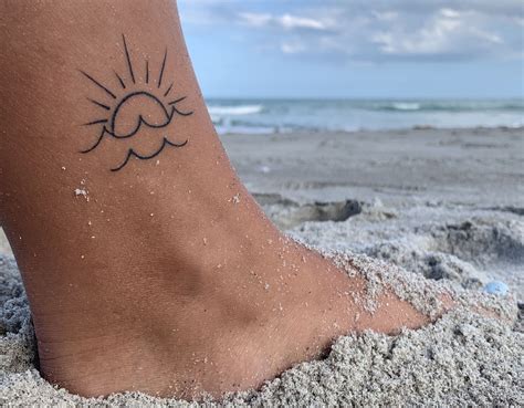 Wave and Sun Tattoo Designs and Meaning Explained